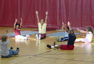 Students stretching arms