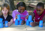 Girls stacking cups